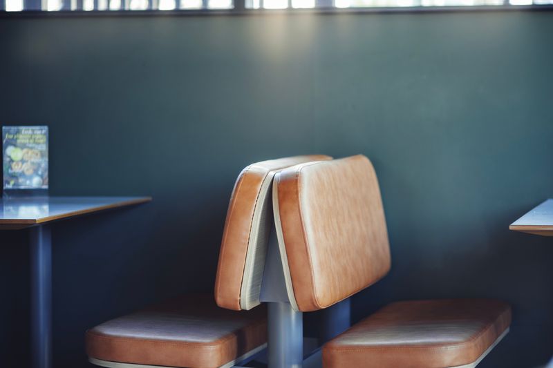 Cozy seating area inside Mod Pizza dining room